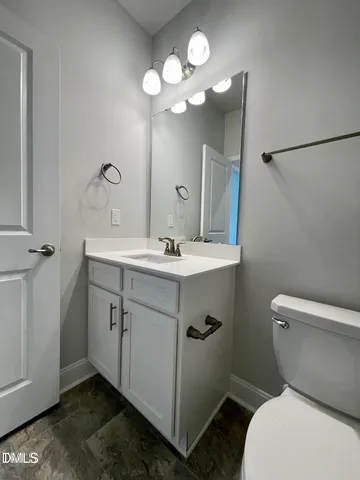 a bathroom with a toilet a sink and a bathtub