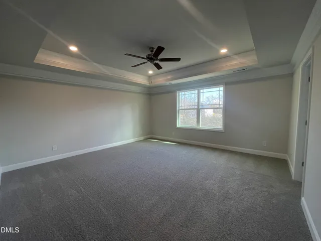a bathroom with double sink and a mirror