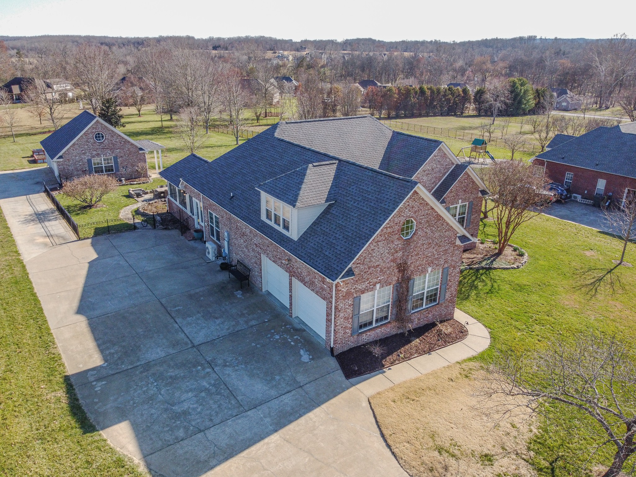1982 Lasea Road Spring Hill, TN 37174 - Photo 1 of 64 a view of a house with pool and a yard