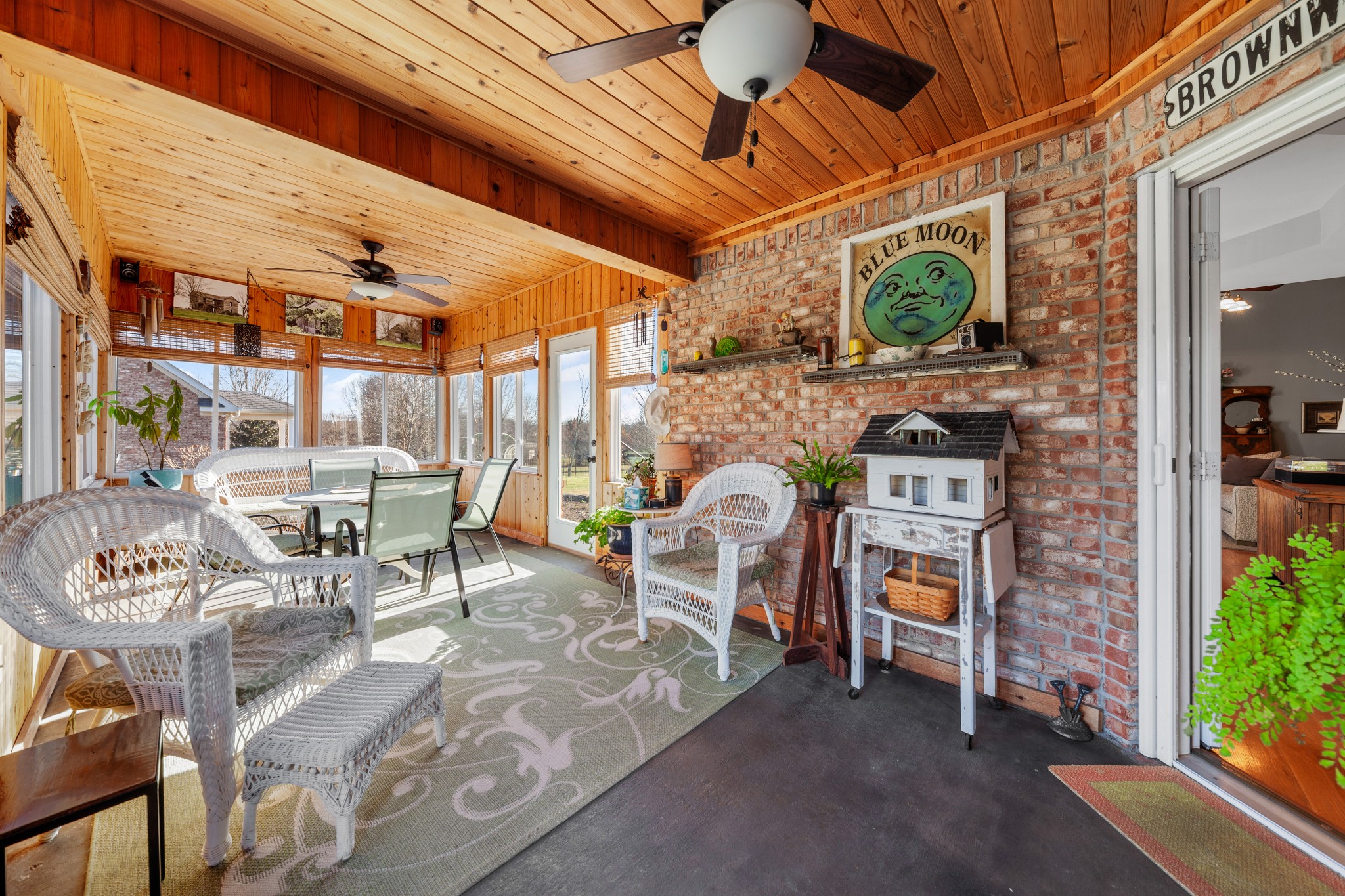 1982 Lasea Road Spring Hill, TN 37174 - Photo 4 of 64 a view of a patio with table and chairs potted plants