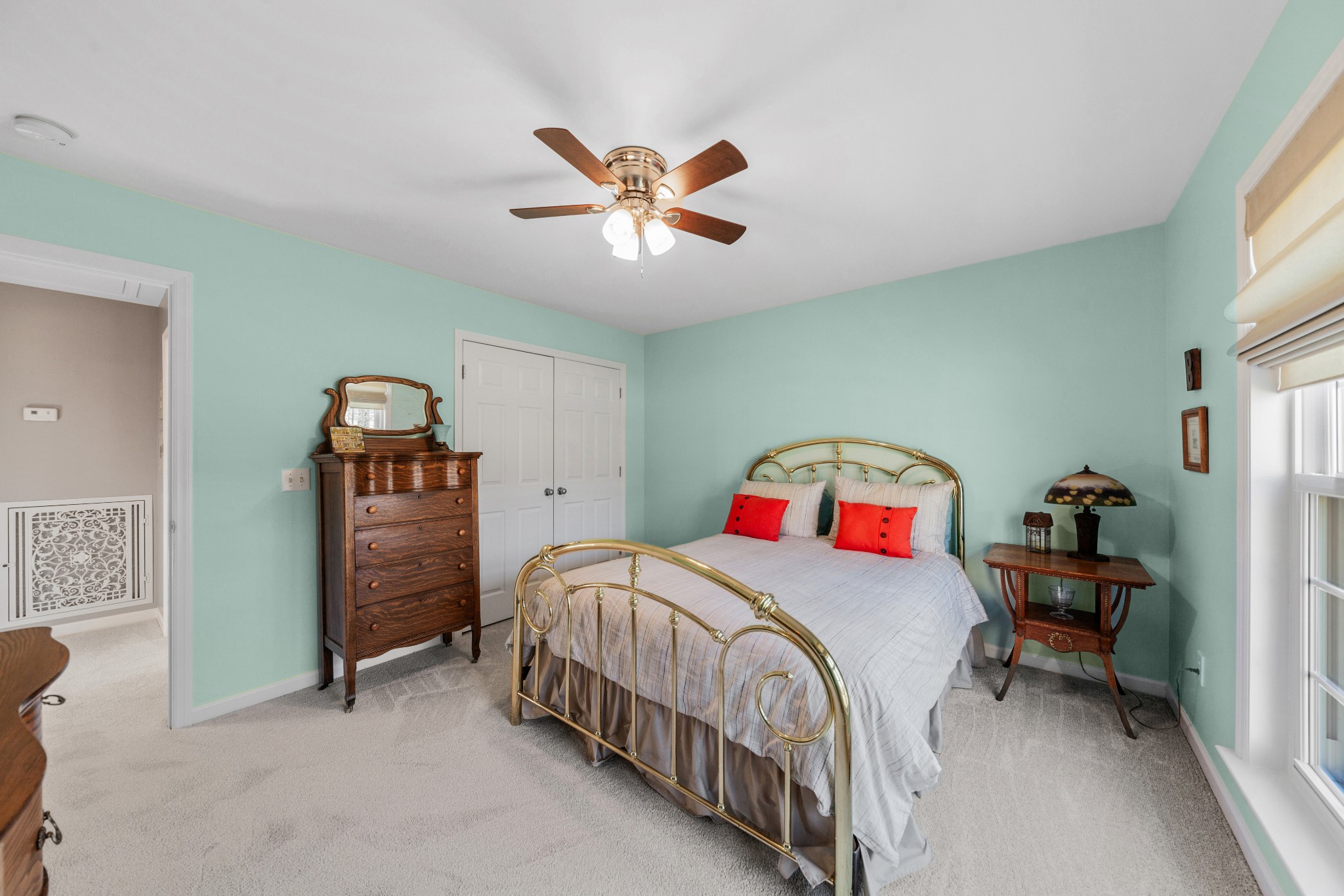 1982 Lasea Road Spring Hill, TN 37174 - Photo 41 of 64 a bedroom with a bed and a chandelier