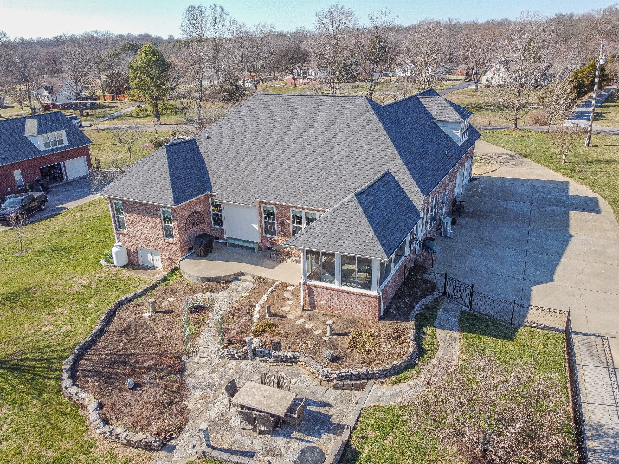 1982 Lasea Road Spring Hill, TN 37174 - Photo 54 of 64 an aerial view of a house with a yard basket ball court and outdoor seating