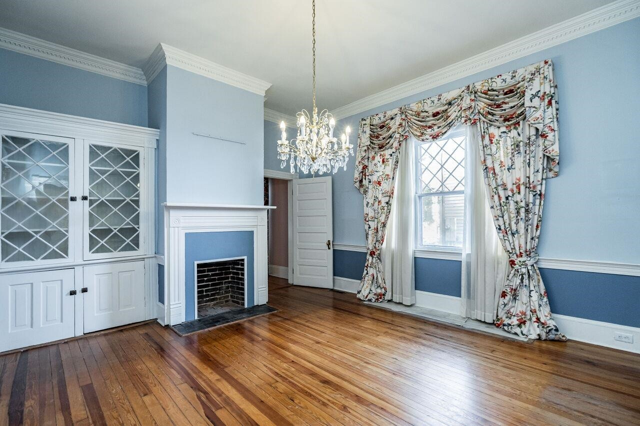 521 East Jones Street Raleigh, NC 27601 - Photo 9 of 29 Dining Room. Note glass-lattice work in windows and the built-in China cabinet