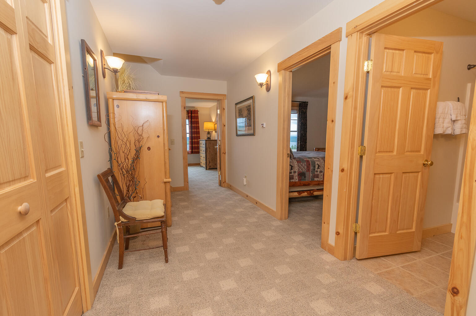 26 Whip Willow Farm Road, Unit 10 Rangeley, ME 04970 - Photo 26 of 35 Lower level hallway