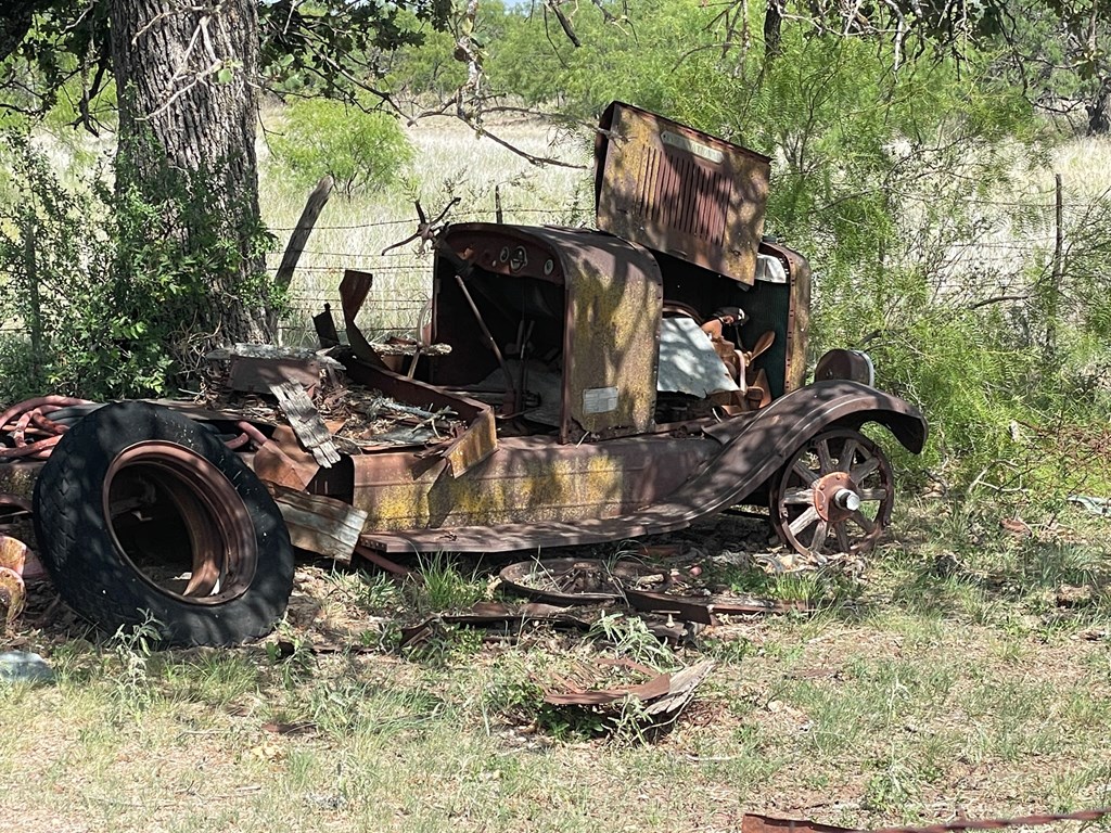 2204 Lange Polk Road Brady, TX 76825 - Photo 20 of 30 a view of a backyard with wooden fence
