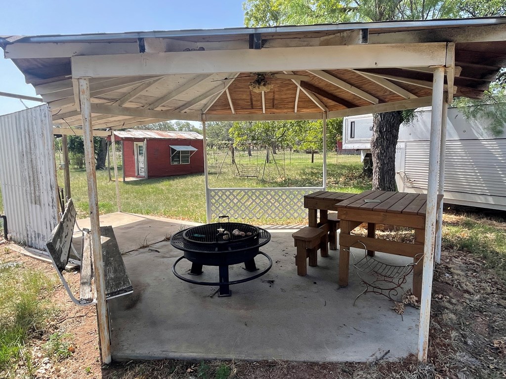 2204 Lange Polk Road Brady, TX 76825 - Photo 21 of 30 a view of a backyard with sitting area