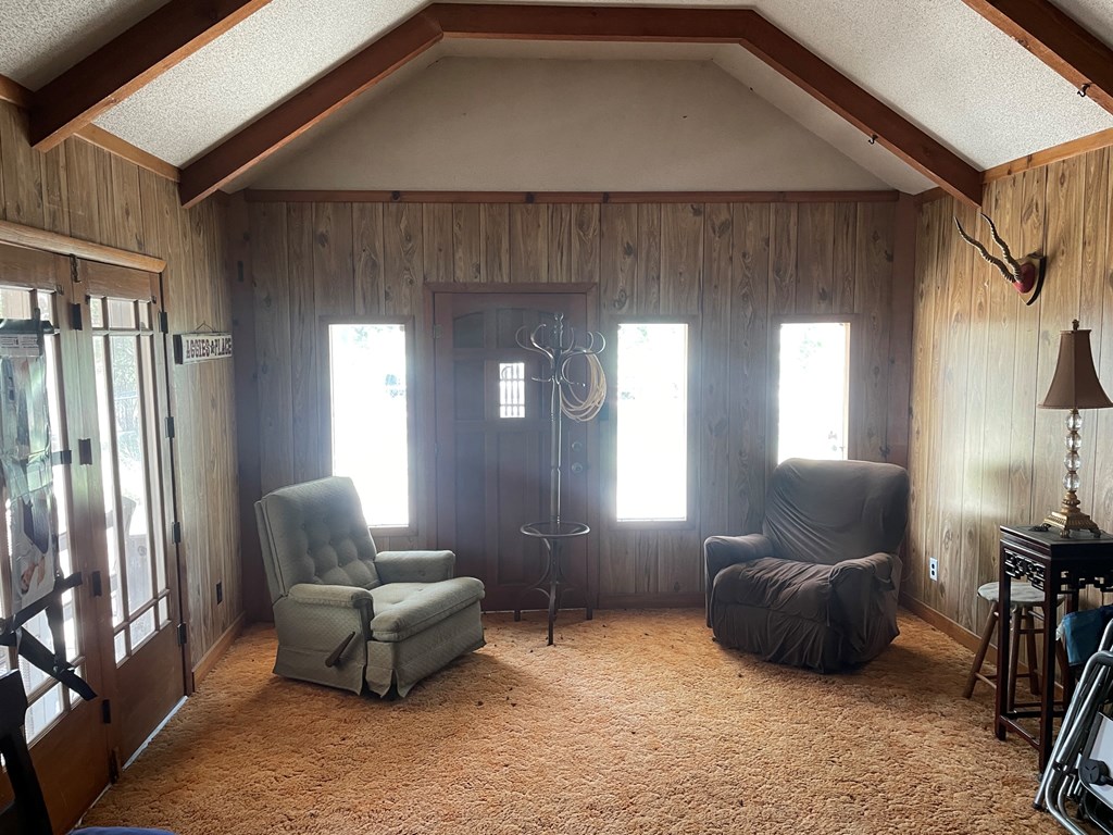 2204 Lange Polk Road Brady, TX 76825 - Photo 23 of 30 a living room with furniture and a window