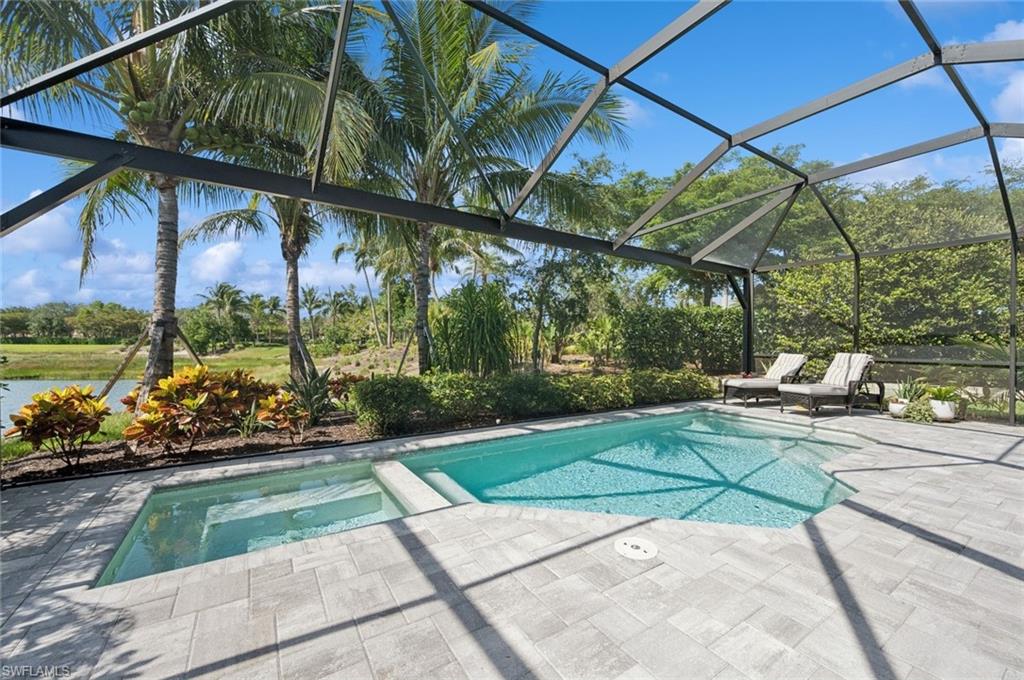 3171 Quilcene Lane Naples, FL 34114 - Photo 16 of 37 a view of yard with patio