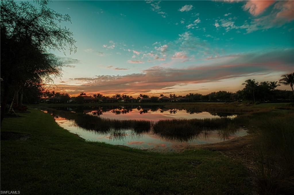 3171 Quilcene Lane Naples, FL 34114 - Photo 18 of 37 a view of lake with mountain