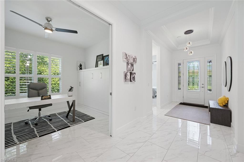 3171 Quilcene Lane Naples, FL 34114 - Photo 26 of 37 a view of livingroom with furniture and windows