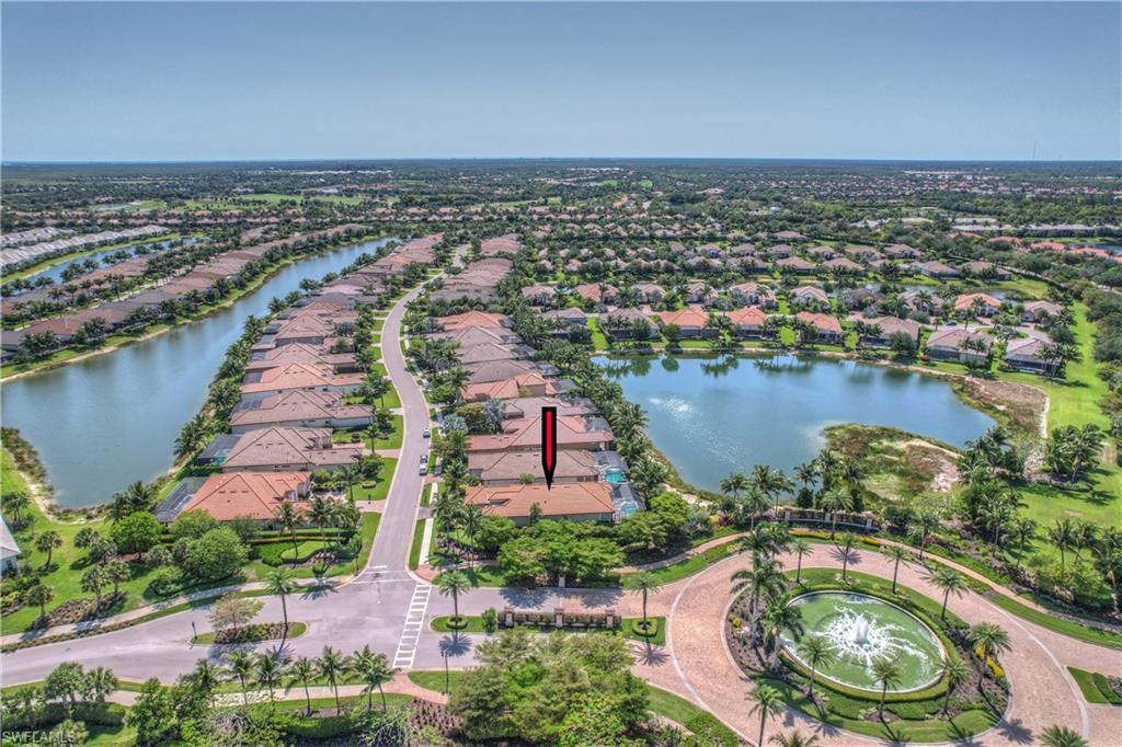 3171 Quilcene Lane Naples, FL 34114 - Photo 31 of 37 an aerial view of a city with lake view