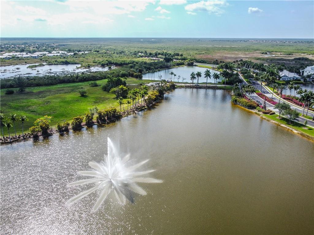 3171 Quilcene Lane Naples, FL 34114 - Photo 35 of 37 an aerial view of a city with lawn chairs