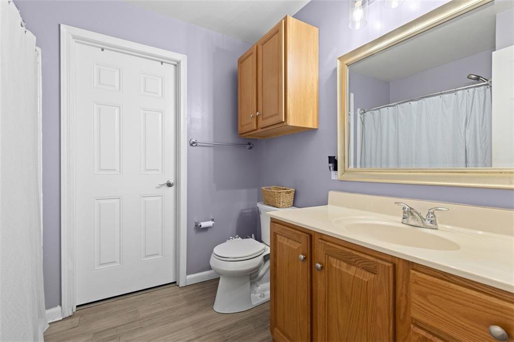 416 Reamer Avenue Carnegie, PA 15106 - Photo 13 of 33 a bathroom with a sink toilet and vanity
