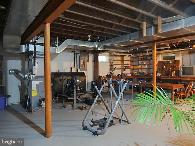 329 Hickory Point Road Pasadena, MD 21122 - Photo 22 of 30 Full Basement w/ Workshop