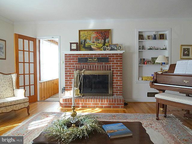 329 Hickory Point Road Pasadena, MD 21122 - Photo 5 of 30 Living Room w/ Wood Burning Fireplace