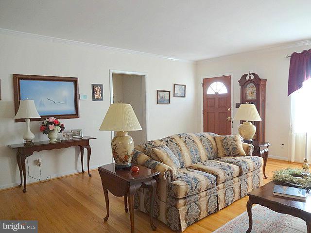 329 Hickory Point Road Pasadena, MD 21122 - Photo 6 of 30 Living Room w/ Hardwood Floors