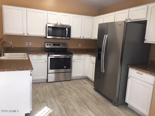 3013 West Pecan Road Phoenix, AZ 85041 - Photo 4 of 16 Updated kitchen