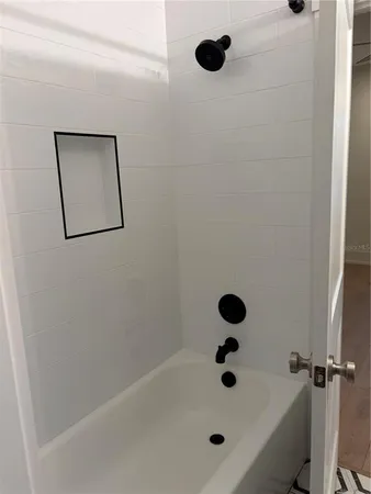 a bathroom with a bathtub
