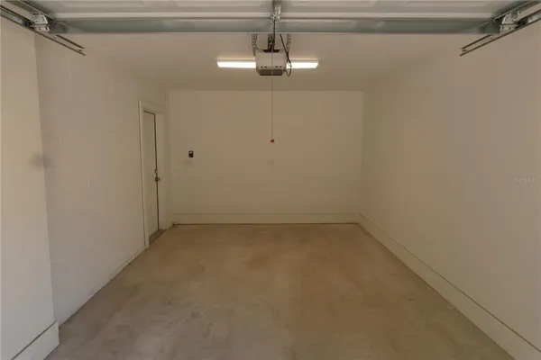 a view of a small space with racks on the wall