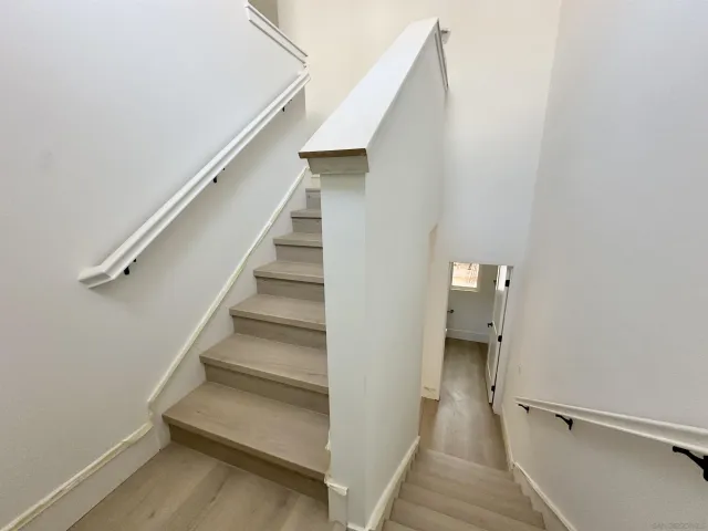 a view of entryway and hall with a hallway