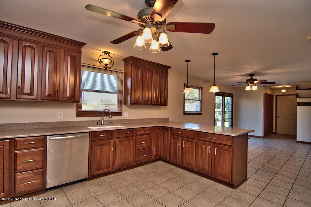 43 Hildebrandt Road Dallas, PA 18612 - Photo 14 of 54 a kitchen with a sink and cabinets