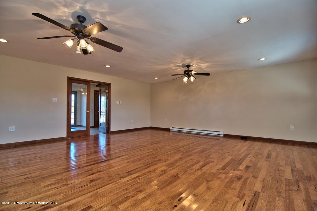 43 Hildebrandt Road Dallas, PA 18612 - Photo 22 of 54 a view of an empty room with wooden floor