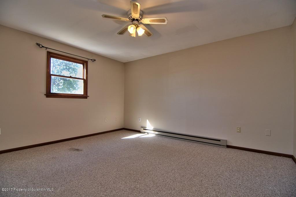 43 Hildebrandt Road Dallas, PA 18612 - Photo 32 of 54 an empty room with windows and fan view