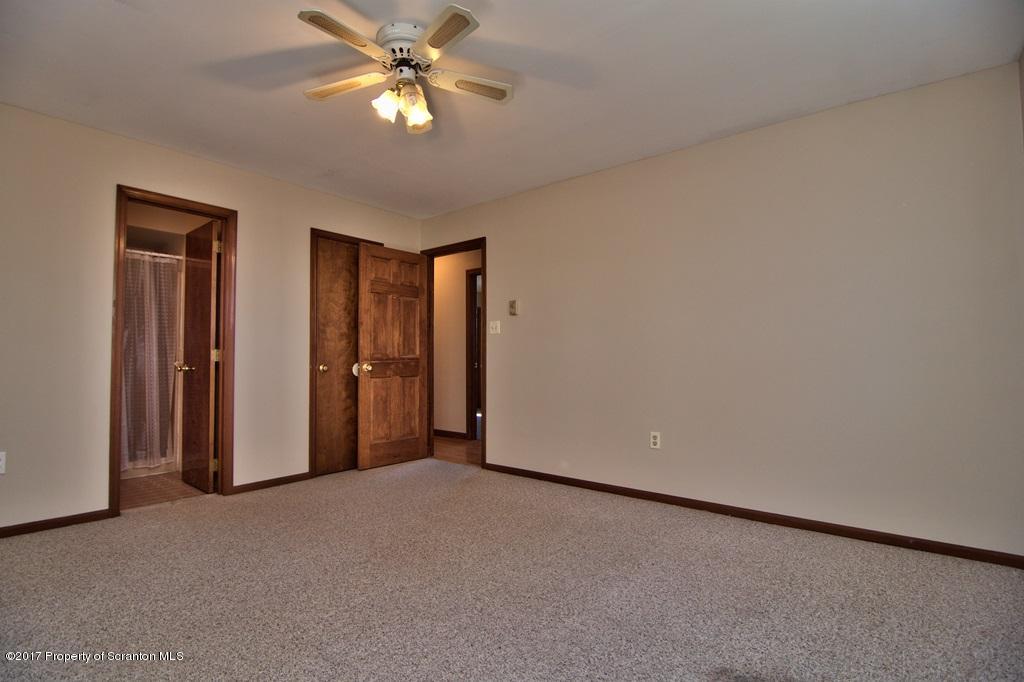 43 Hildebrandt Road Dallas, PA 18612 - Photo 34 of 54 a view of a room with a ceiling fan and a fan