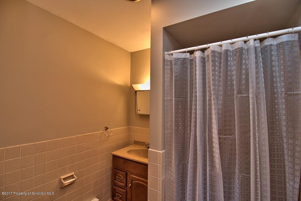 43 Hildebrandt Road Dallas, PA 18612 - Photo 35 of 54 a bathroom with a shower and a sink