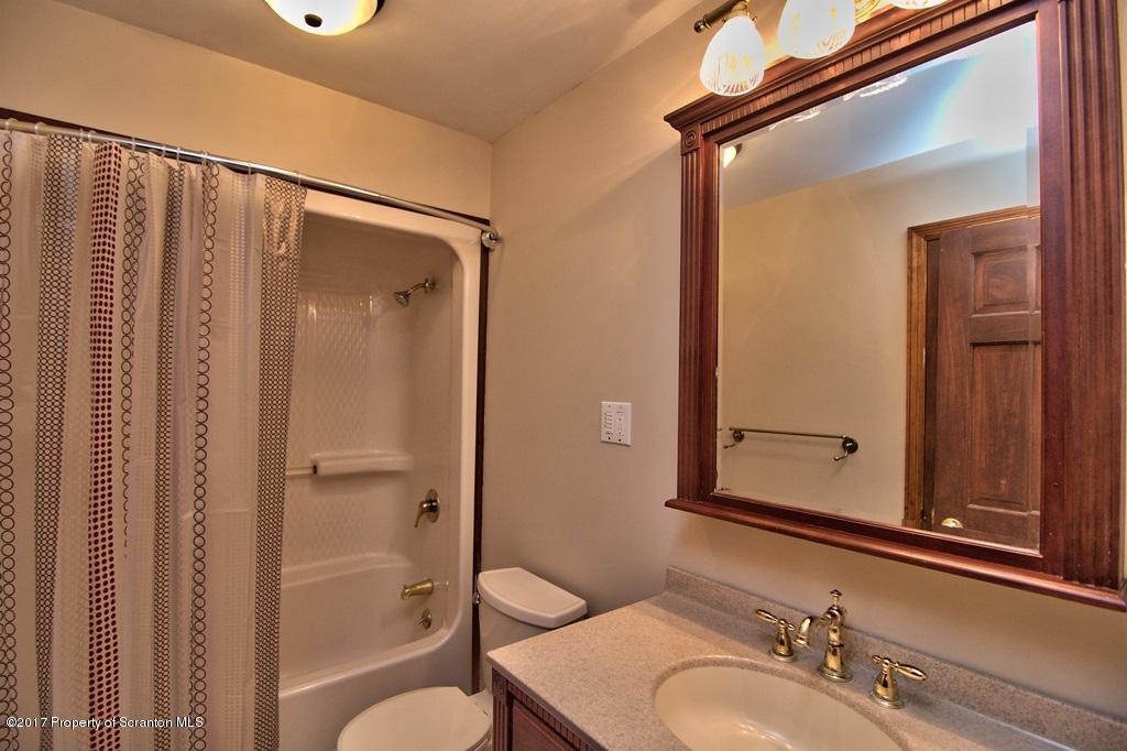 43 Hildebrandt Road Dallas, PA 18612 - Photo 43 of 54 a bathroom with a granite countertop sink toilet and shower