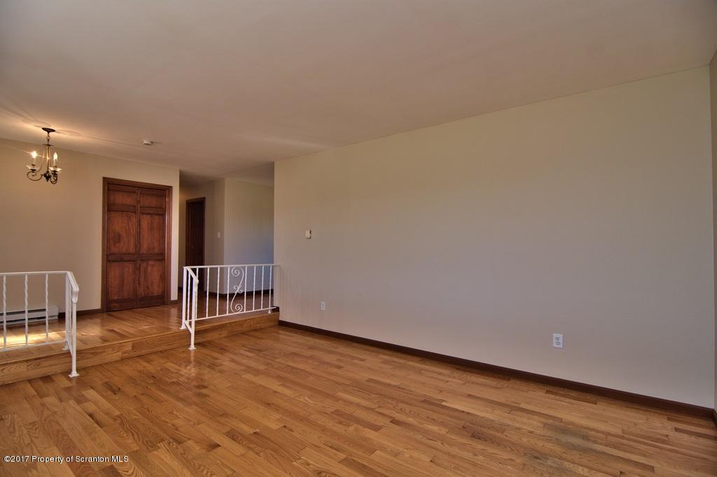 43 Hildebrandt Road Dallas, PA 18612 - Photo 6 of 54 a view of empty room with wooden floor