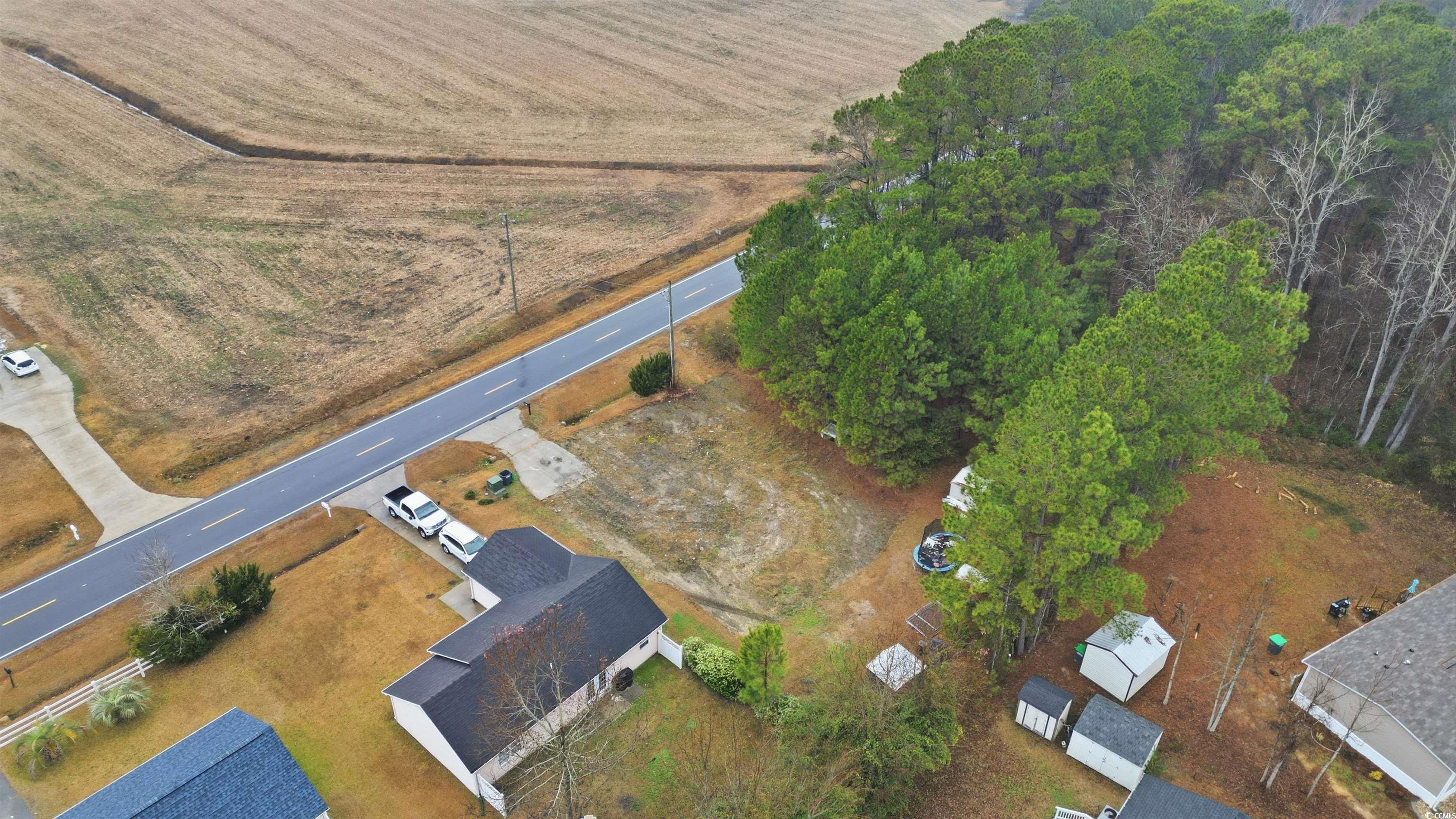 5176 Spring Street Loris, SC 29569 - Photo 6 of 12 Aerial view of property and surrounding area with rural landscape
