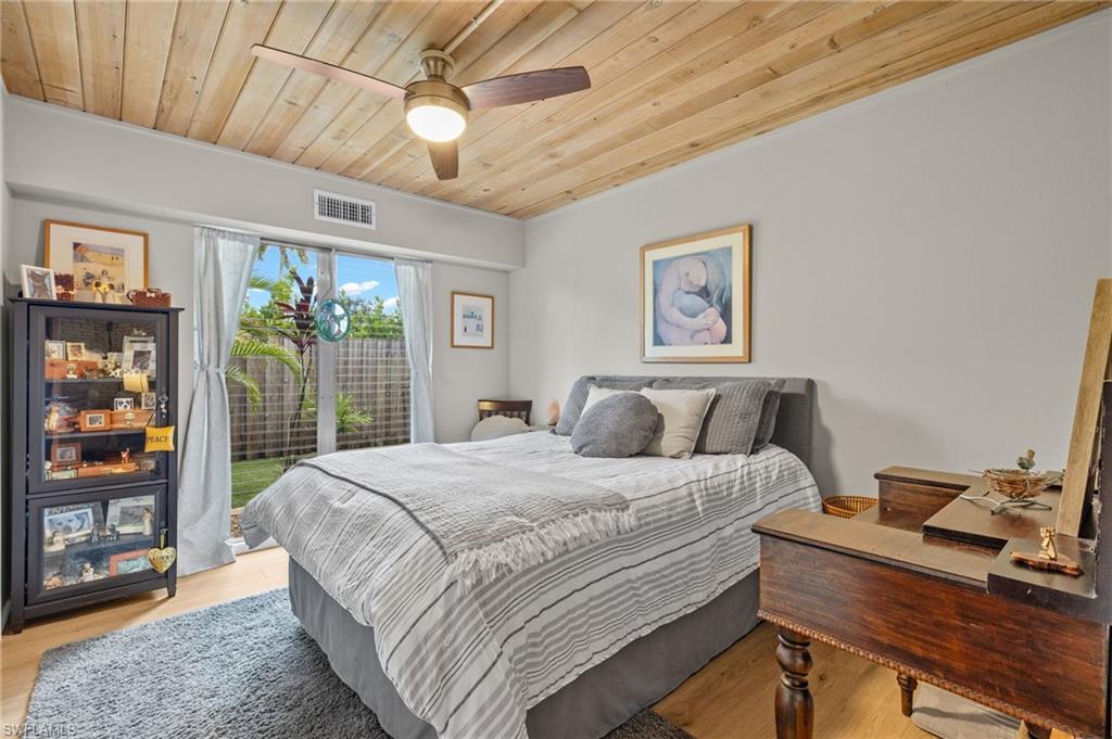 1599 Grove Avenue Fort Myers, FL 33901 - Photo 20 of 25 a bedroom with a bed and a window