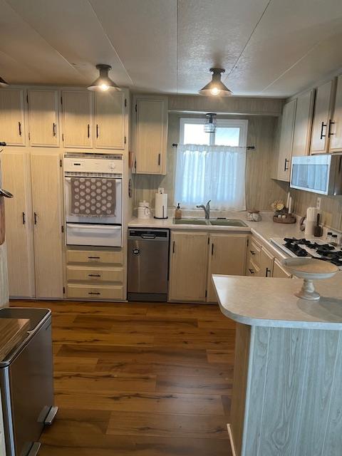 4125 Mchenry Avenue, Unit 35 Modesto, CA 95356 - Photo 4 of 20 a kitchen with stainless steel appliances granite countertop a sink stove and refrigerator