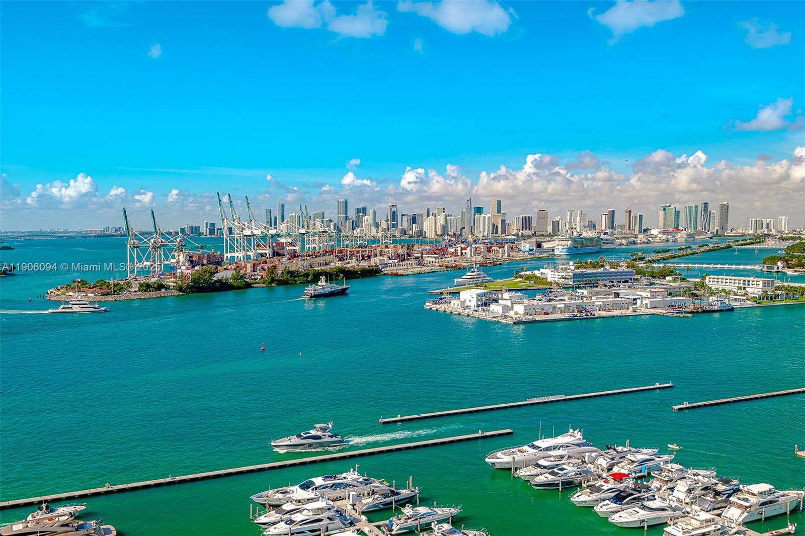 90 Alton Road, Unit 2506 Miami Beach, FL 33139 - Photo 22 of 22 a view of a lake with a city