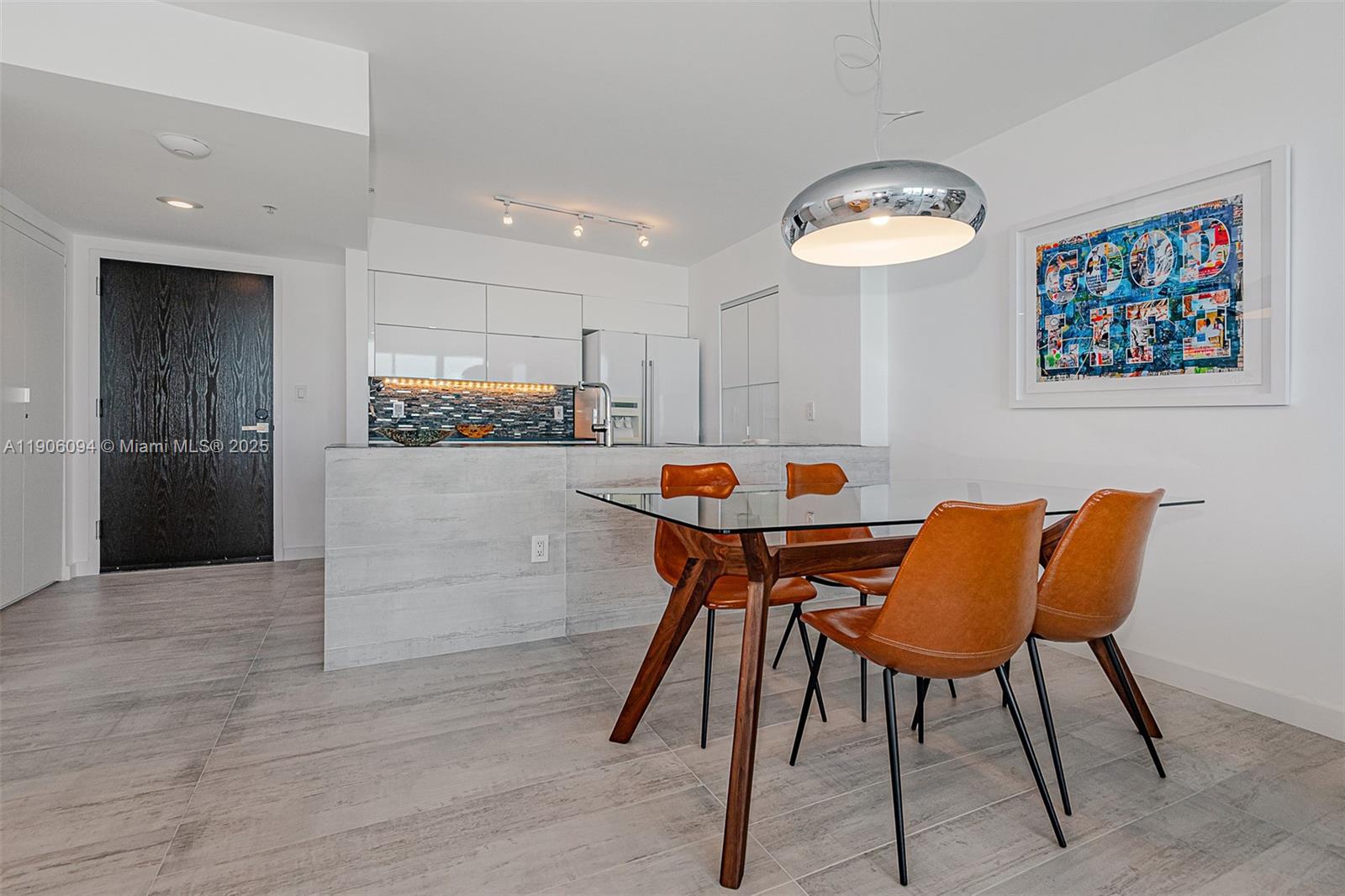 90 Alton Road, Unit 2506 Miami Beach, FL 33139 - Photo 8 of 22 a outdoor space with furniture and a kitchen view