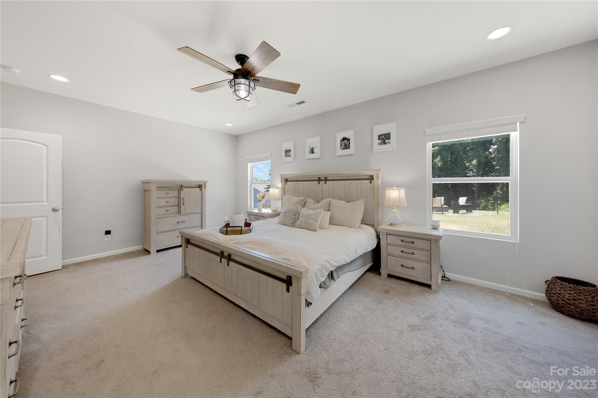 360 Wyndham Forest Circle Midland, NC 28107 - Photo 18 of 40 a bed room with a bed and window
