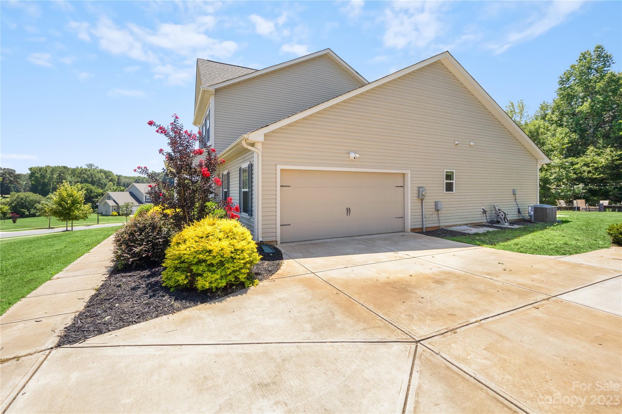 360 Wyndham Forest Circle Midland, NC 28107 - Photo 38 of 40 a view of a back yard of the house