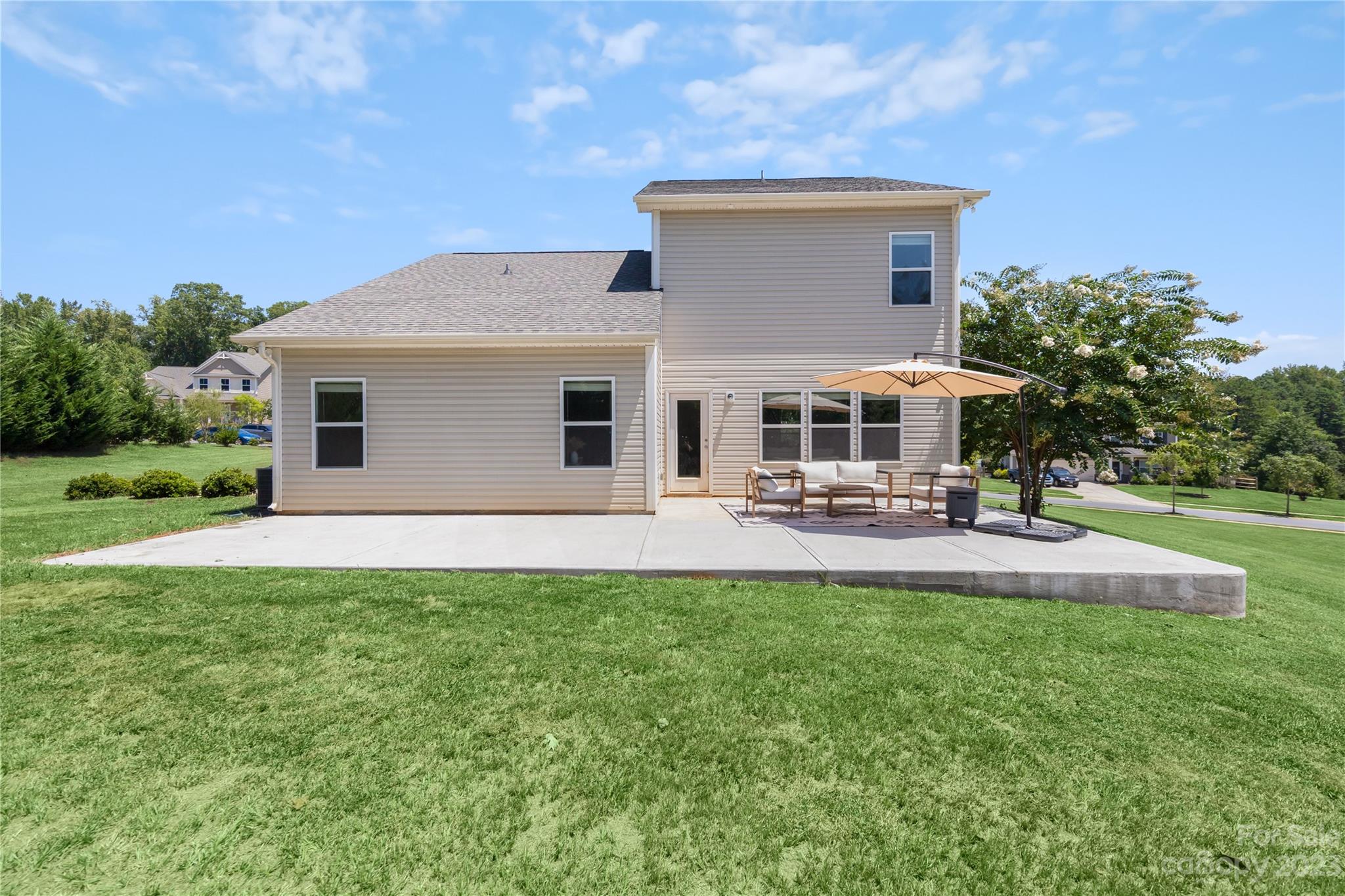 360 Wyndham Forest Circle Midland, NC 28107 - Photo 39 of 40 a house view with a garden space