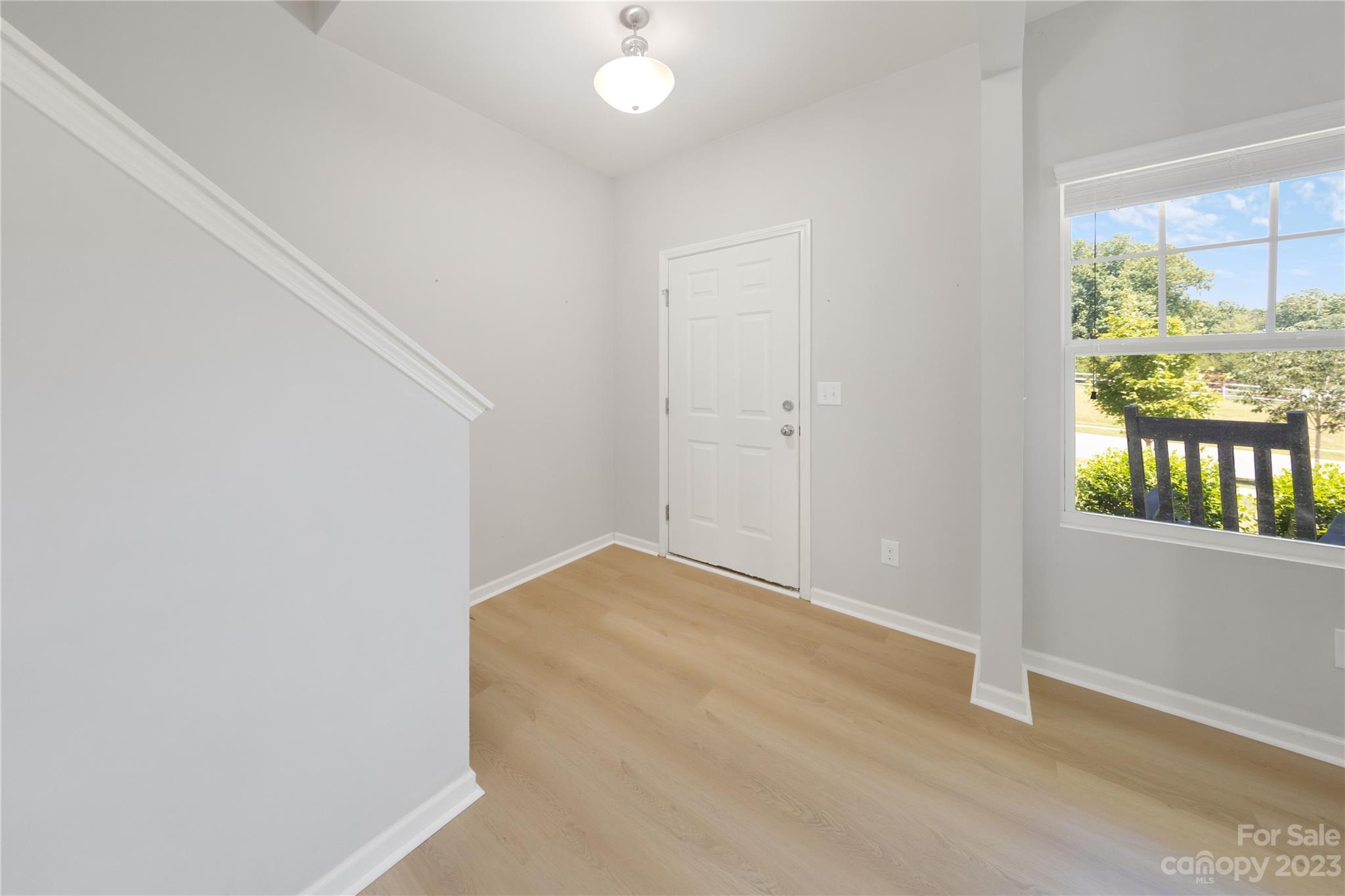 360 Wyndham Forest Circle Midland, NC 28107 - Photo 5 of 40 a view of an empty room with a window