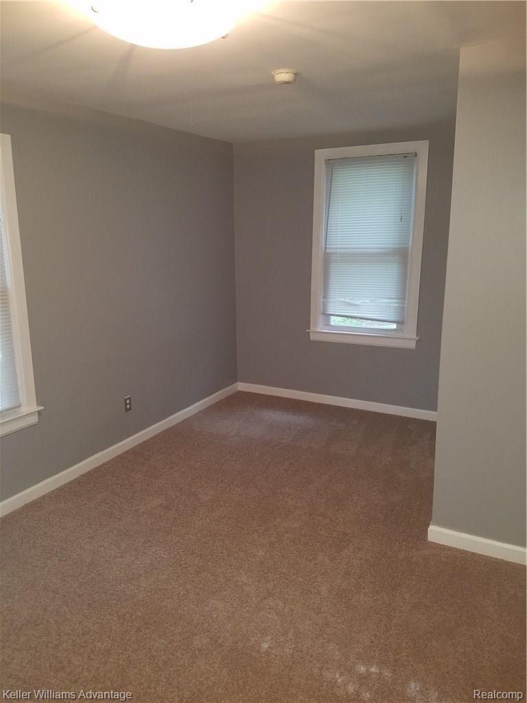 2236 Oxford Road Berkley, MI 48072 - Photo 8 of 13 Big Master bedroom with walk-in closet