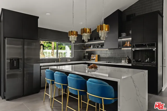 a bedroom with a bed and a mirror