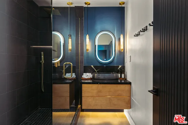 a view of a house with swimming pool and sitting area