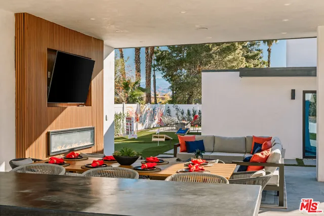 a view of a swimming pool with a patio