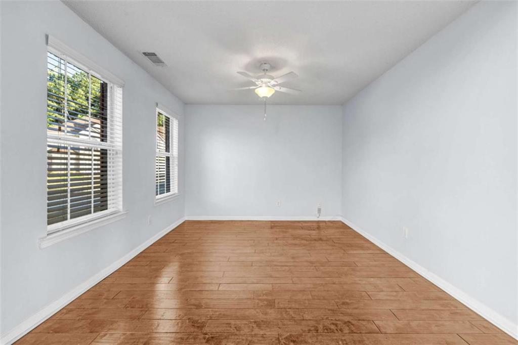 1903 Cobblestone Court Conyers, GA 30012 - Photo 9 of 30 a view of empty room with window