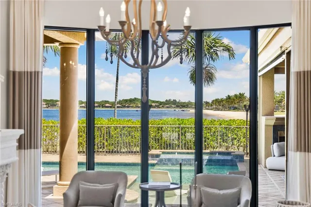 a very nice looking room with a large window and a couch