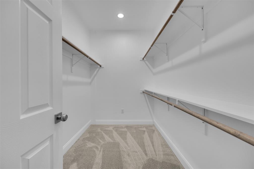 407 Dallas Street Rice, TX 75155 - Photo 16 of 25 a view of a room with racks on the wall