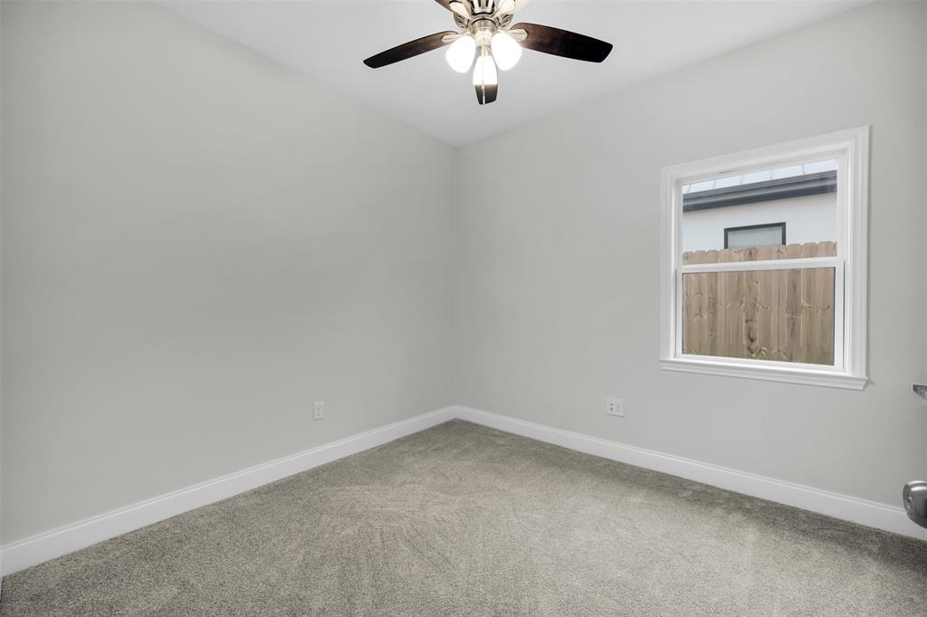 407 Dallas Street Rice, TX 75155 - Photo 20 of 25 an empty room with a window