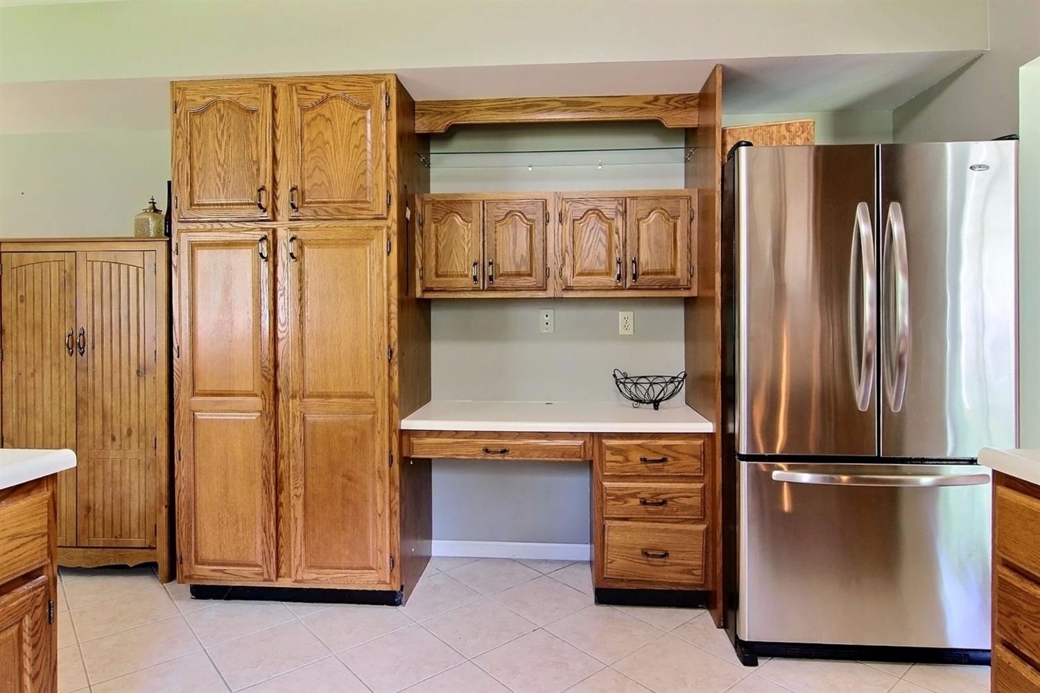 2218 Coldspring Road Crown Point, IN 46307 - Photo 3 of 10 a kitchen with appliances a refrigerator and cabinets