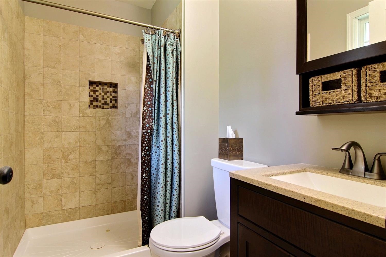 2218 Coldspring Road Crown Point, IN 46307 - Photo 10 of 10 a bathroom with a sink a toilet and shower